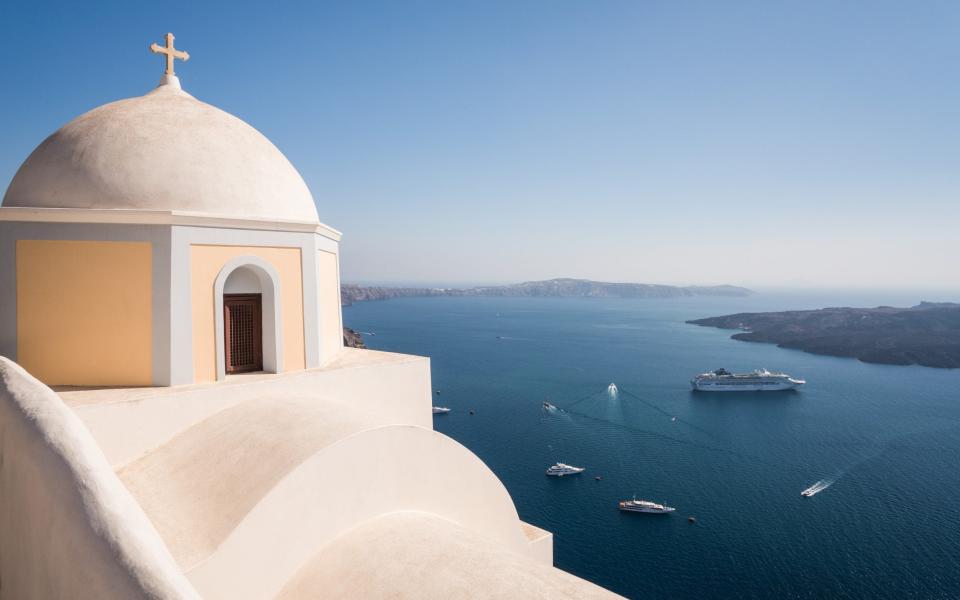 A ship off the coast of Santorini - Getty