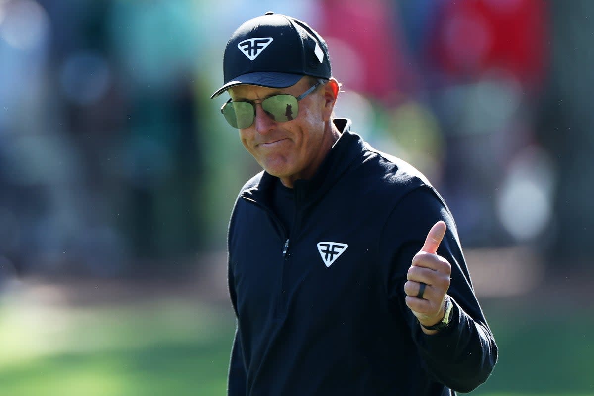 Phil Mickelson swept aside recent controversies to post a brilliant final round of 65 (EPA)