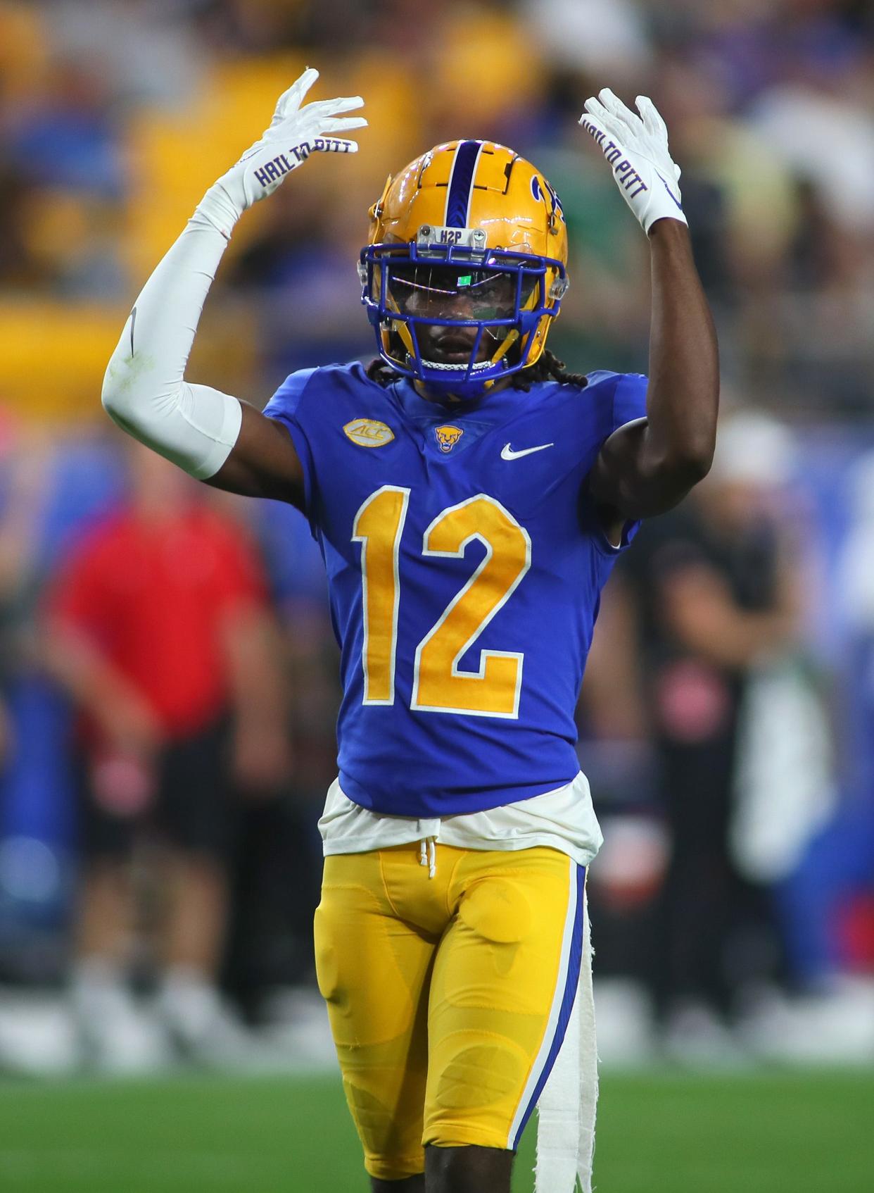 Pittsburgh Panthers M.J. Devonshire pumps up the crowd during the second half against the Cincinnati Bearcats at Acrisure Stadium in Pittsburgh, PA on September 9, 2023