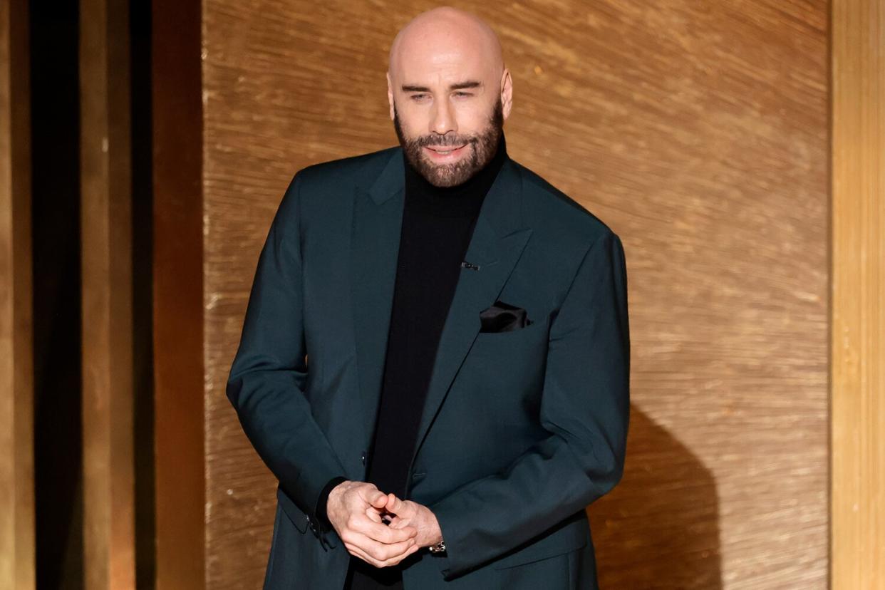 John Travolta speaks onstage during the 95th Annual Academy Awards at Dolby Theatre on March 12, 2023 in Hollywood, California.