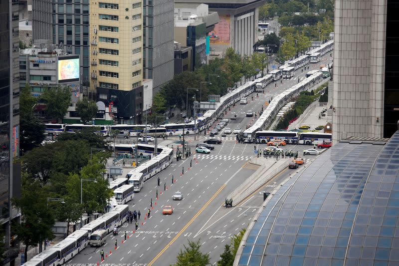 Police buses are parked surrounding the Gwanghwamun square in central Seoul