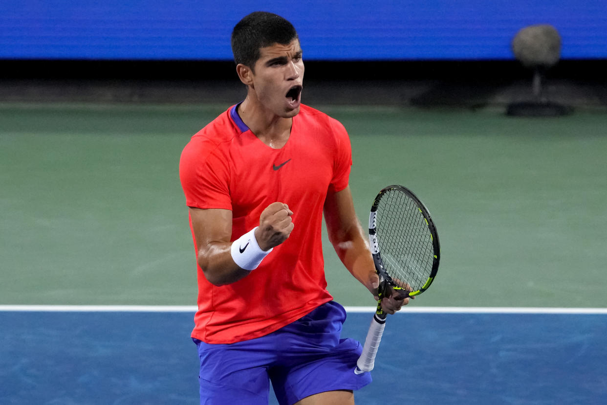 MASON, OHIO - AUGUST 19: Carlos Alcaraz of Spain reacts after winning a point during his match against Cameron Norrie of Great Britain on day seven of the Western & Southern Open at Lindner Family Tennis Center on August 19, 2022 in Mason, Ohio. (Photo by Dylan Buell/Getty Images)