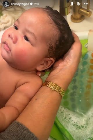 <p>chrissy teigen/instagram</p> Chrissy Teigen gives son Wren a bath.