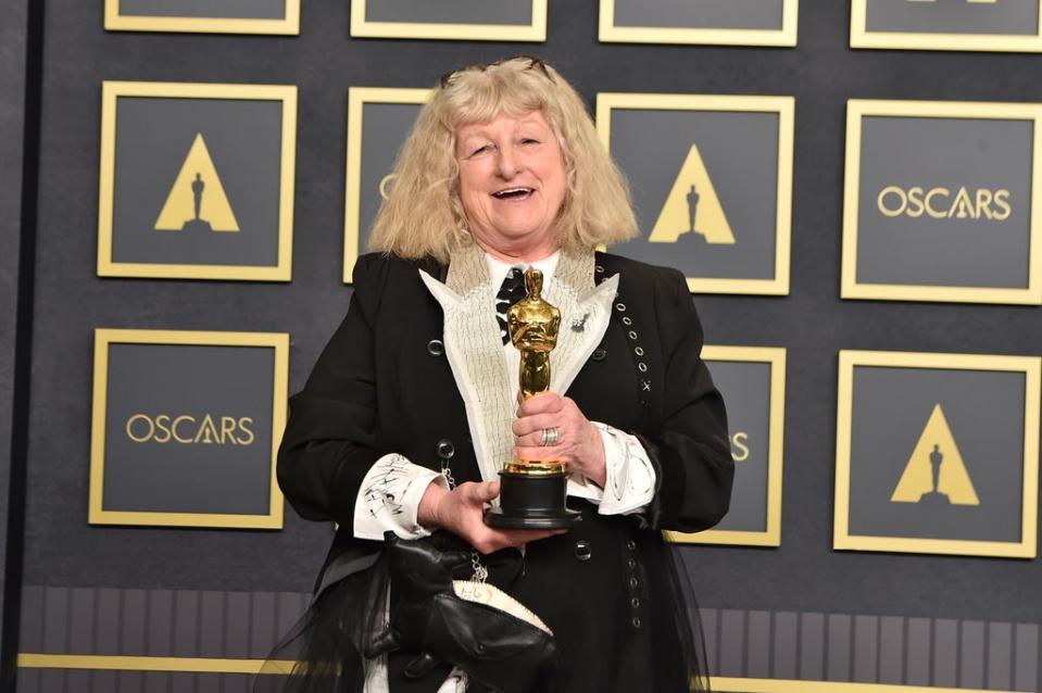 Jenny Beavan, winner of the award for best costume design for Cruella, poses in the press room at the 2022 Oscars (Jordan Strauss/AP) (AP)