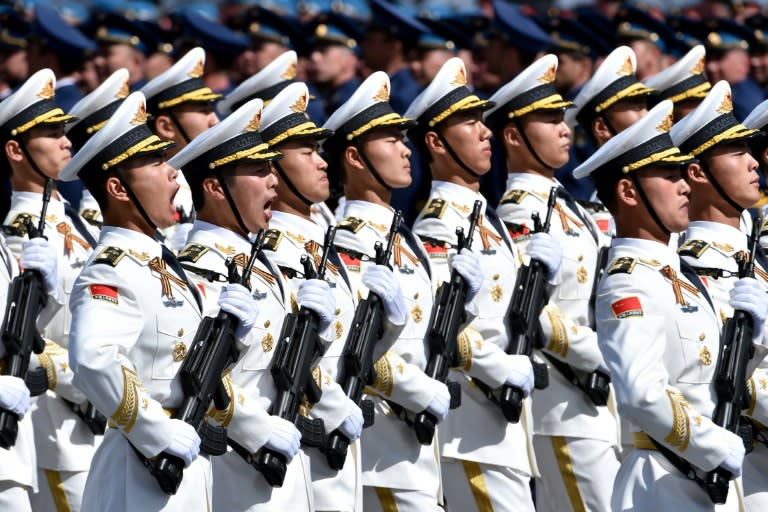 China's soldiers march through Red Square during the Victory Day military parade in Moscow on May 9, 2015