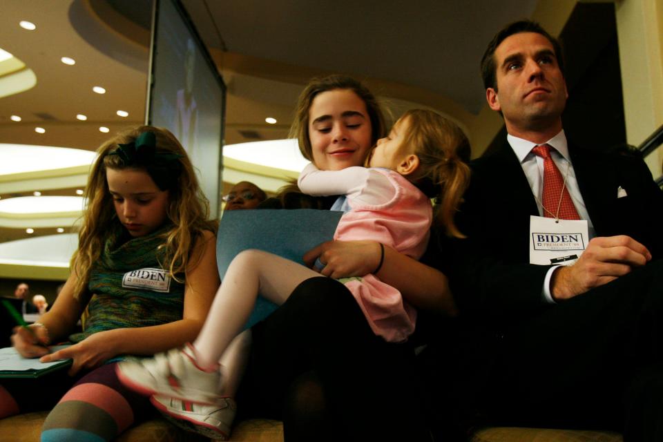 Joe Biden’s grandchildren Finnegan, Naomi, Natalie and son Beau, sit in the front row at the Democratic National CommitteeGetty Images