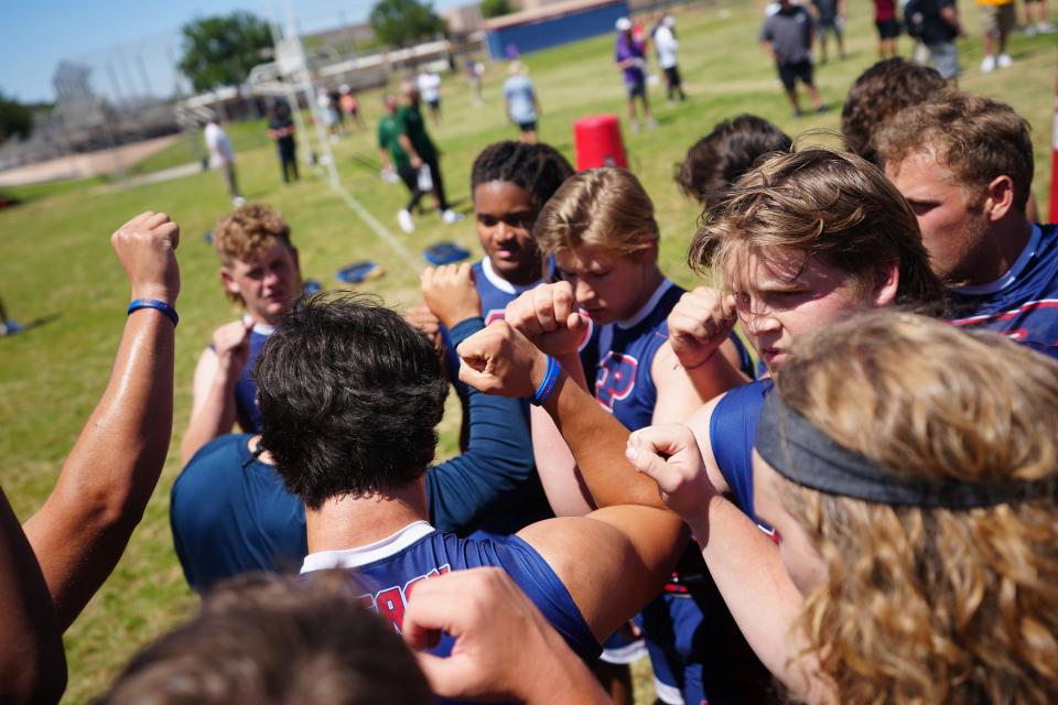 May 18, 2022; Gilbert, Arizona; USA; Perry's bigs gather after a drill during Chandler district Jamboree at Perry High School.