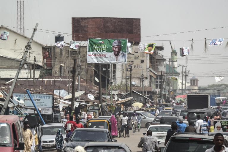 Banners and posters of candidates are displayed on March 27, 2015 in a street of Kaduna prior to Nigeria's presidential poll