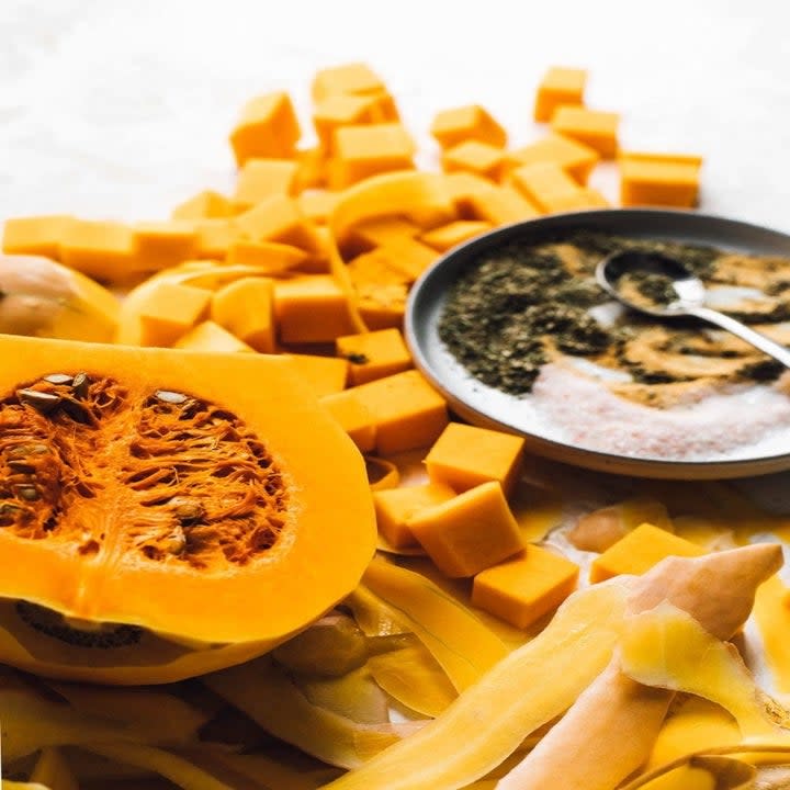 Preparing butternut squash.