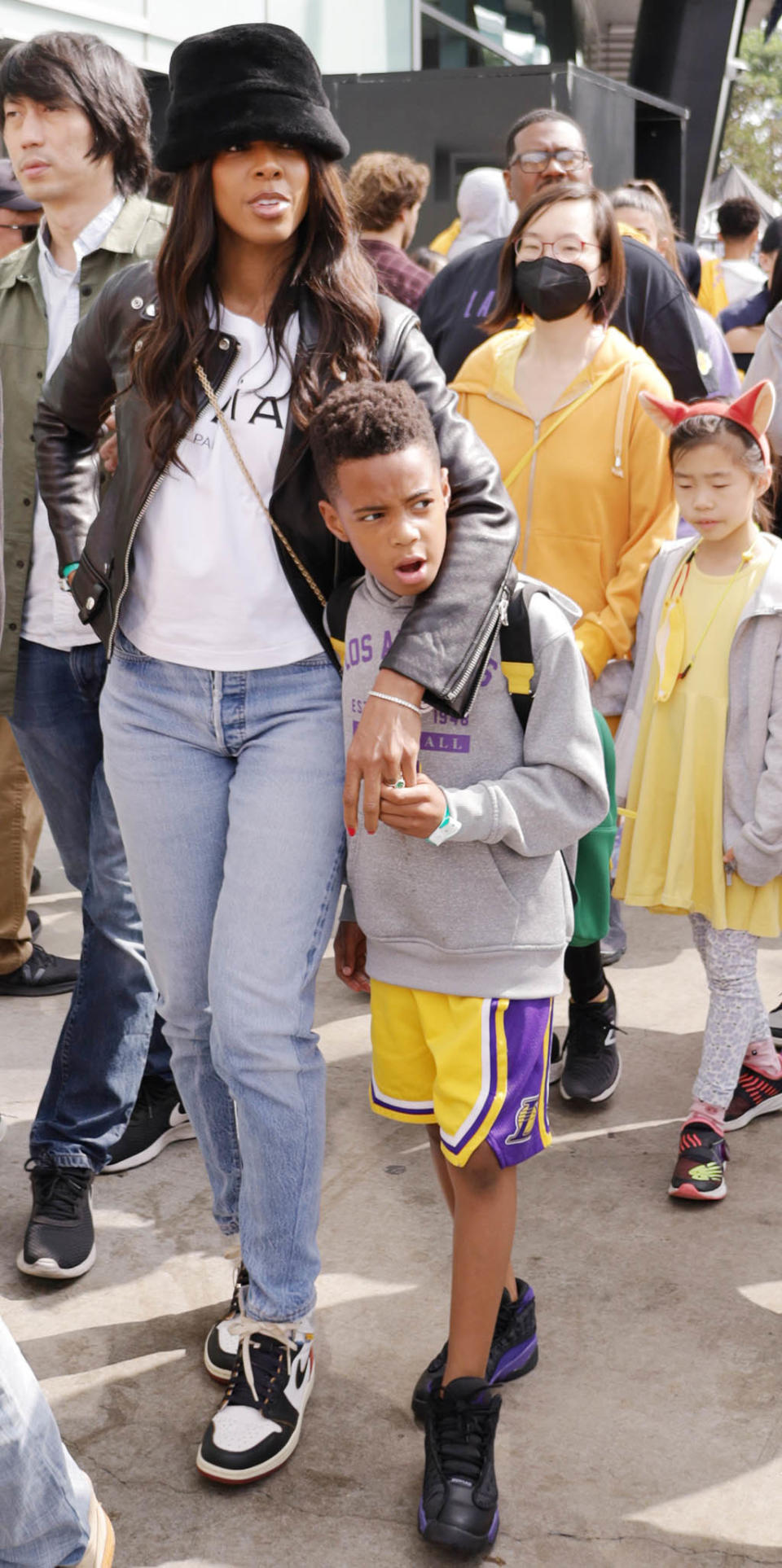 Kelly Rowland arrives at Denver Nuggets vs Los Angeles Lakers Game with her son Titan Weatherspoon in Los Angeles, CA. - Credit: Damian Avitia /London Entertainm