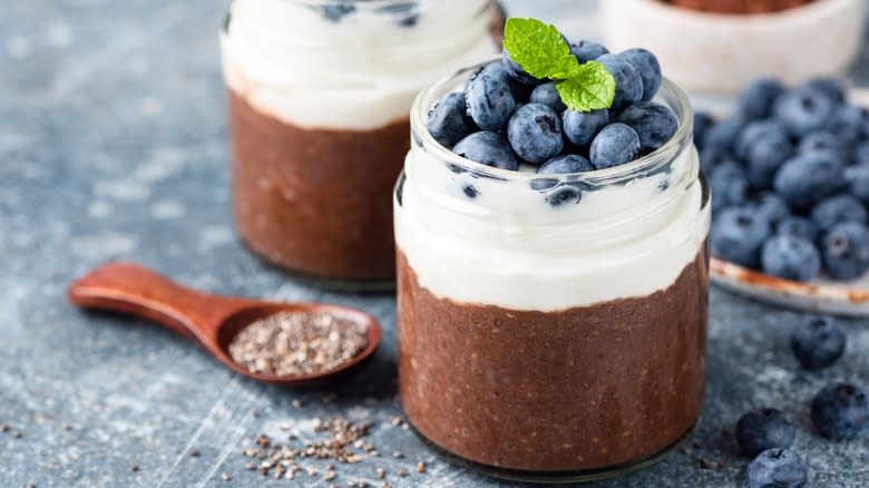 pudding with blueberries in jars