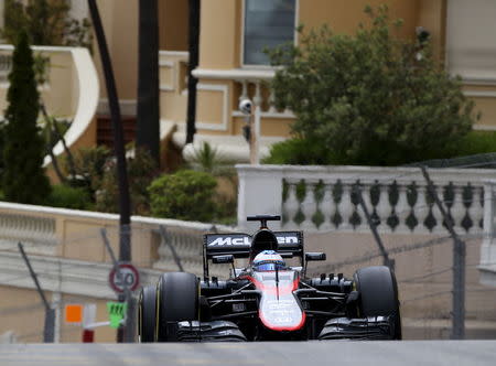 McLaren Honda Formula One driver Fernando Alonso of Spain drives his car during the first free practice session at the Monaco F1 Grand Prix May 21, 2015. REUTERS/Stefano Rellandini
