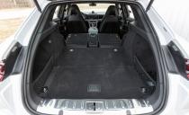 <p>The altered roofline doesn't radically expand cargo capacity-the 49 cubic feet with the rear seats folded isn't even two cubes greater than that of the regular Panamera-but it's accompanied by a larger rear hatch that extends down to the rear bumper and a flat load floor that makes the space somewhat more useful.</p>