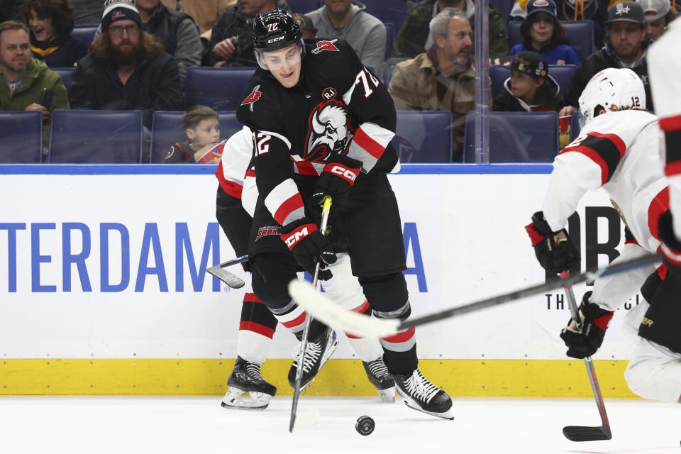 Buffalo Sabres right wing Tage Thompson (72) controls the puck during the first period of the team's NHL hockey game against the Ottawa Senators on Thursday, Jan. 11, 2024, in Buffalo, N.Y. (AP Photo/Jeffrey T. Barnes)