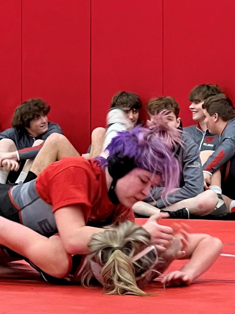 Elgin wrestler Hallie Winslow, top, competes with Marion Harding's Sophie Holt during the Marion County Wrestling Meet last week at Pleasant.