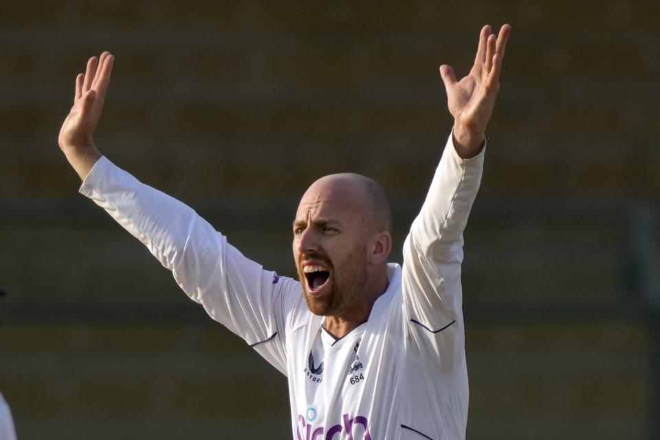 England's Jack Leach appeals LBW out of Pakistan Nauman Ali during the first day of third test cricket match between England and Pakistan, in Karachi, Pakistan, Saturday, Dec. 17, 2022. (AP Photo/Fareed Khan)