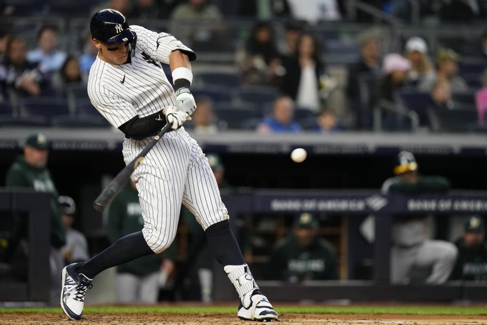 New York Yankees' Aaron Judge bats during the third inning of the team's baseball game against the Oakland Athletics on Tuesday, May 9, 2023, in New York. Judge reached first base on a fielding error by Jace Peterson, and Jose Trevino scored. (AP Photo/Frank Franklin II)