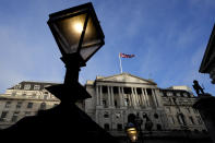 The Union Jack flag waves on top of the Bank of England in London, Thursday, Feb. 2, 2023. The Bank of England is expected to raise interest rates by as much as half a percentage point. That would outpace the latest hike by the U.S. Federal Reserve. The move on Thursday comes as the central bank seeks to tame decades-high inflation that has driven a cost-of-living crisis and predictions of recession. (AP Photo/Frank Augstein)