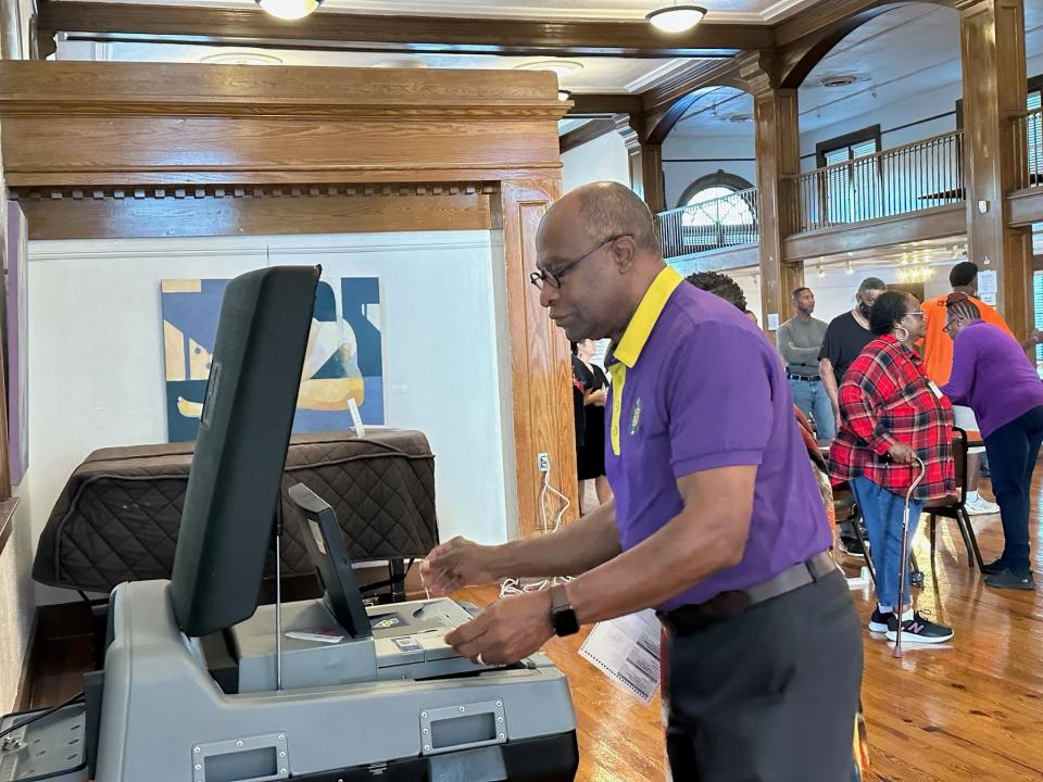 Johnny DuPree casts his ballot early Tuesday, Nov. 8, 2022, at Hattiesburg, Miss., Cultural Center. Hattiesburg's former four-term mayor is the Democratic nominee for Mississippi's 4th District of the U.S. House of Representatives.