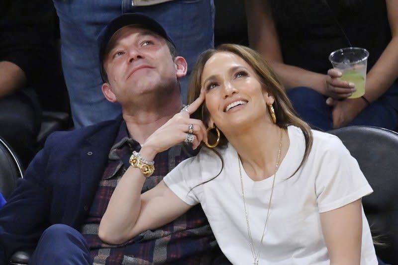 Jennifer Lopez (R) and Ben Affleck attend a Los Angeles Lakers and Golden State Warriors basketball game in March. File Photo by Jim Ruymen/UPI