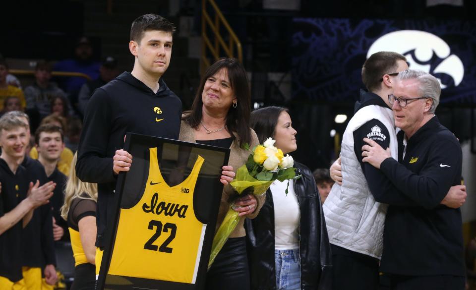 Patrick McCaffery, left, is pictured with his family during senior day on March 10. McCaffery is transferring.