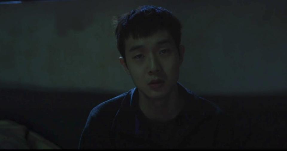 Parasite Ki-woo looking solemn