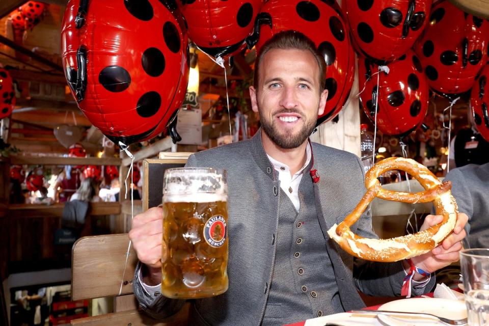 Kane enjoys the traditions of Oktoberfest in Munich (EPA)