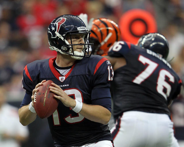 Texans win first playoff game, 31-10 over Bengals