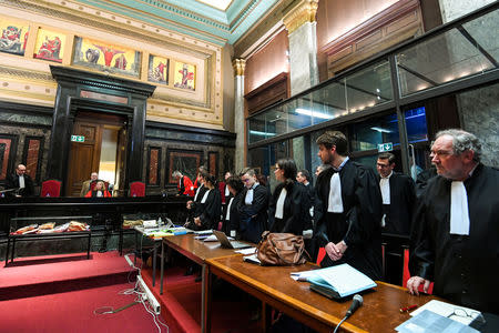 Lawyers wait for the start of the trial of Mehdi Nemmouche and Nacer Bendrer, who are suspected of killing four people in a shooting at Brussels' Jewish Museum in 2014, at Brussels' Palace of Justice, Belgium January 15, 2019. Frederic Sierakowski/Pool via REUTERS
