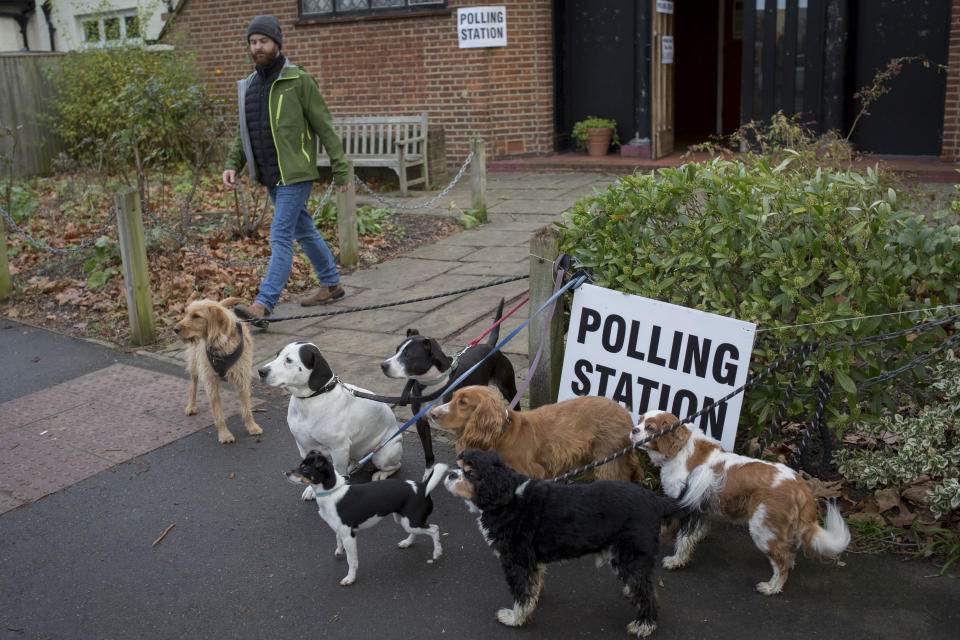 Dog owners gather their assorted breeds for an Instagram post on the Dulwich Village Insta feed, outside St. Barnabas community hall in Dulwich Village, south London.