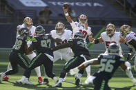 San Francisco 49ers quarterback Jimmy Garoppolo passes against the Seattle Seahawks during the first half of an NFL football game, Sunday, Nov. 1, 2020, in Seattle. (AP Photo/Scott Eklund)