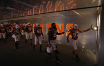 Members of the Texas Longhorns touch the longhorns as they walk to the field after half time during the game against LSU Tigers Saturday Sept. 7, 2019 at Darrell K Royal-Texas Memorial Stadium in Austin, Tx. ( Photo by Edward A. Ornelas )