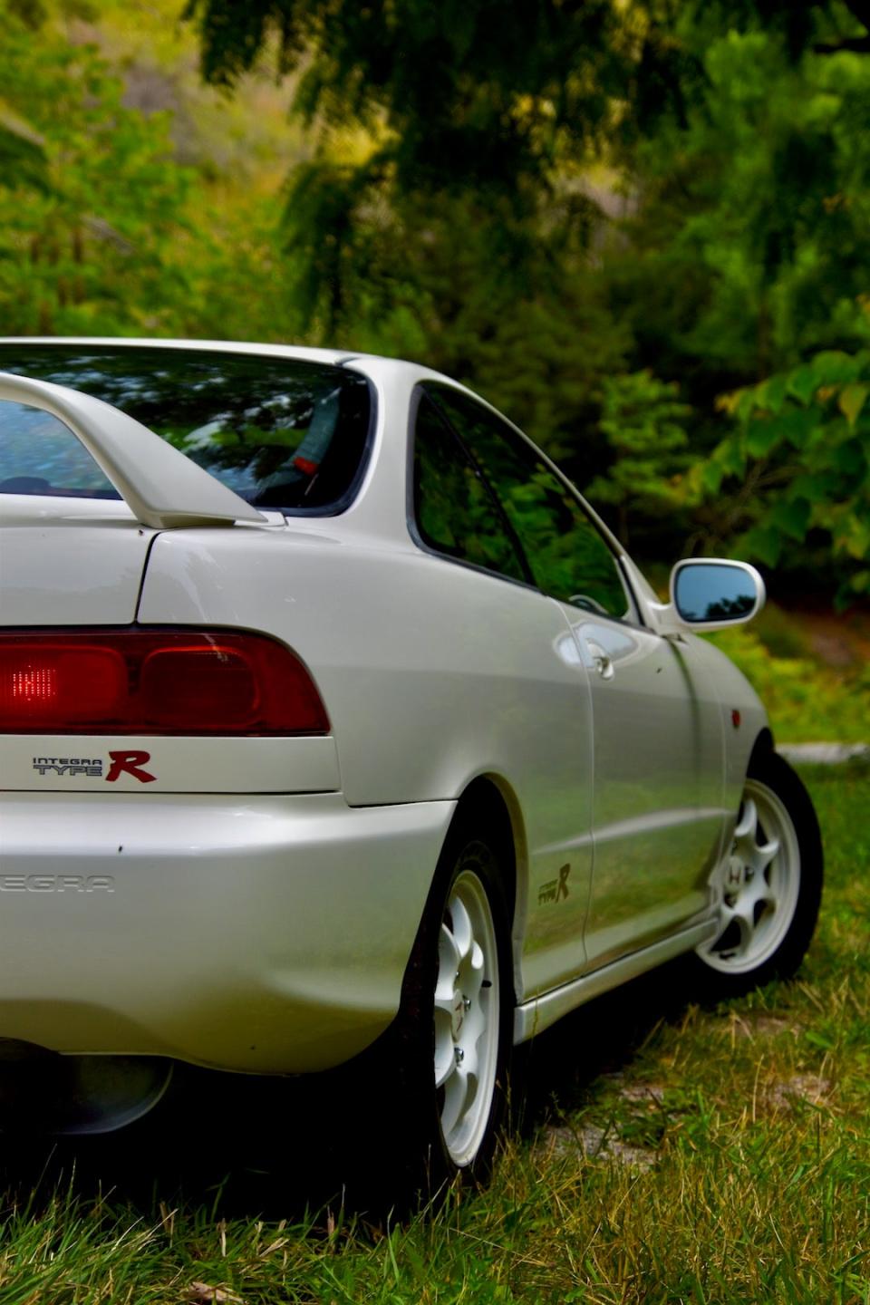 1996 Honda Integra Type R side profile with a grassy backrgound