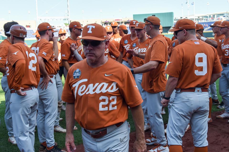 Texas baseball coach David Pierce leaves the field after the Longhorns' loss to Texas A&M in last year's College World Series in Omaha, Neb. Pierce has taken the Longhorns to Omaha three times, but they've gone 0-2 in two of those trips.