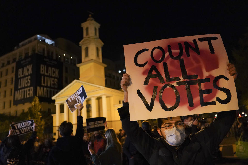 (AP Photo/John Minchillo)