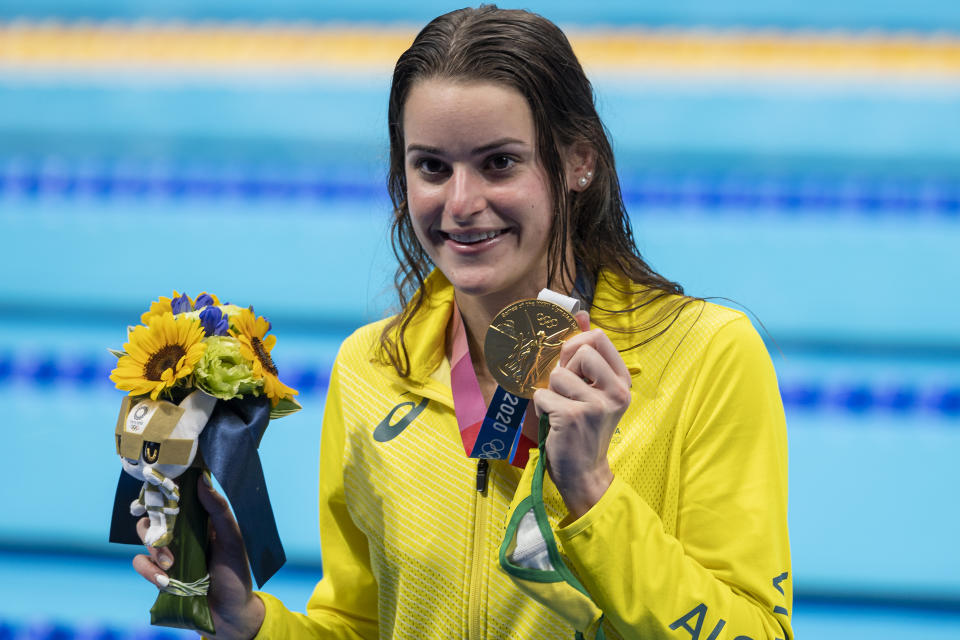 Kaylee Mckeown (pictured) shows her gold medal after winning the women 100m Backstroke final.