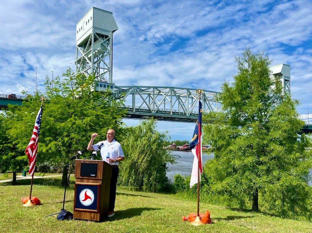 North Carolina Department of Transportation Division 3 Engineer Chad Kimes speaks at a news conference on Tuesday, May 7, 2024, announcing the completion of the months-long Cape Fear Memorial Bridge preservation project.