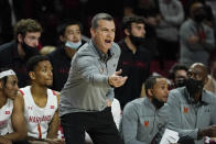 Maryland head coach Mark Turgeon talks to his team during the first half of an NCAA college basketball game against Quinnipiac, Tuesday, Nov. 9, 2021, in College Park, Md. (AP Photo/Julio Cortez)