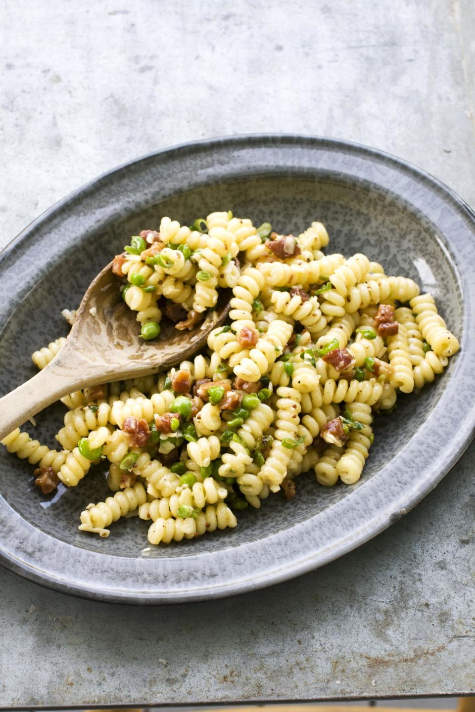 This image taken on April 29, 2013, shows carbonara pasta salad in a serving dish in Concord, N.H. (AP Photo/Matthew Mead)