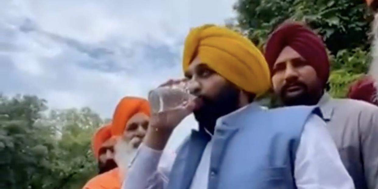 A still from a video of Punjab Chief Minister Bhagwant Mann drinking a glass of water from the Kali Bein rivulet.