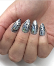 <p>Go chrome or go home! Take inspiration from nail artist <a href="https://www.instagram.com/p/B-288u5D7wu/" rel="nofollow noopener" target="_blank" data-ylk="slk:Lauren VonLipstick" class="link ">Lauren VonLipstick</a> who painted black spiderwebs on top of chrome nail polish for superhero vibes. </p><p><a class="link " href="https://www.amazon.com/Color-Club-Halographic-Polish-Multicolored/dp/B00ACTL94A?tag=syn-yahoo-20&ascsubtag=%5Bartid%7C10072.g.33239588%5Bsrc%7Cyahoo-us" rel="nofollow noopener" target="_blank" data-ylk="slk:SHOP HOLOGRAPHIC POLISH">SHOP HOLOGRAPHIC POLISH</a></p>