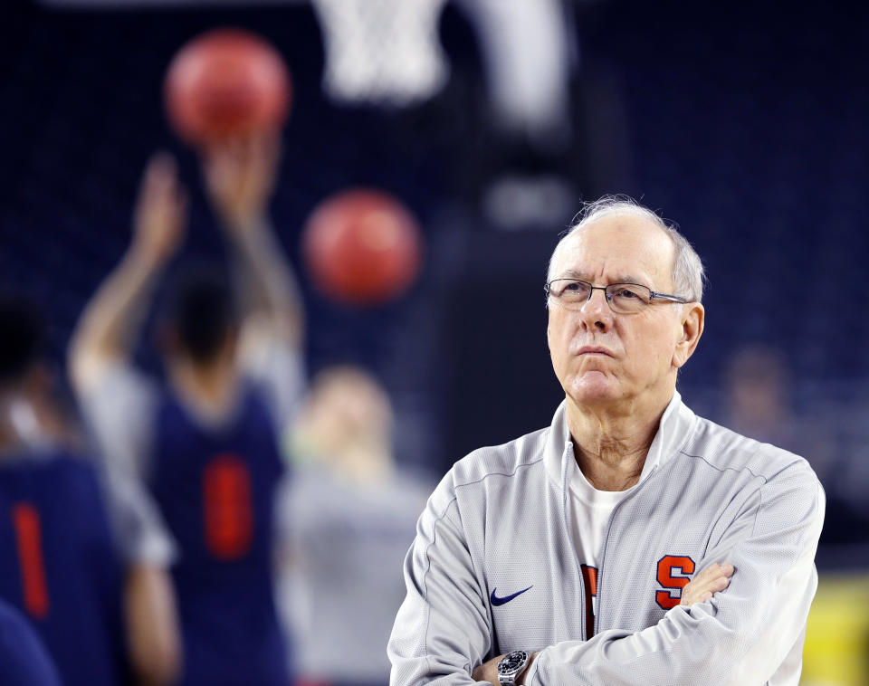 FILE -Syracuse head coach Jim Boeheim watches during a practice session for the NCAA Final Four college basketball tournament Friday, April 1, 2016, in Houston. Syracuse coach Jim Boeheim is retiring after 47 years of leading the university's basketball program, the team announced Wednesday, March 8, 2023 after a loss knocked them out of the ACC Conference Tournament. (AP Photo/Eric Gay, File)