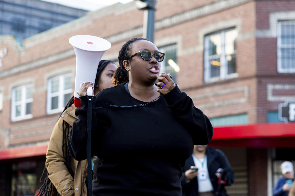 Monet Carter-Mixon, Manny Ellis's sister, speaks to a crowd after the verdict is read during the trial of three Tacoma police officers in the killing of Manny Ellis, at Pierce County Superior Court, Thursday, Dec. 21, 2023, in Tacoma, Wash. (AP Photo/Maddy Grassy)