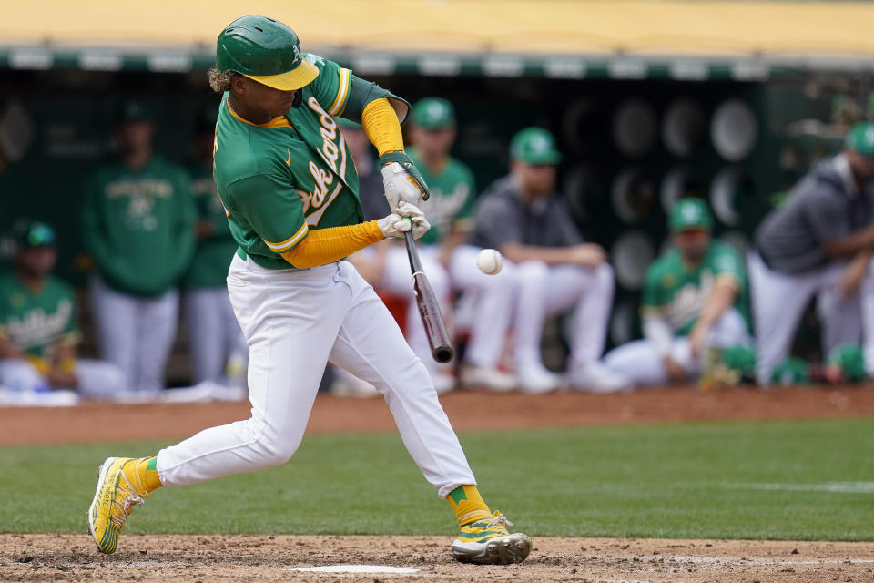 Oakland Athletics' Cristian Pache hits a single against the Chicago White Sox during the fifth inning of a baseball game in Oakland, Calif., Sunday, Sept. 11, 2022. (AP Photo/Godofredo A. Vásquez)