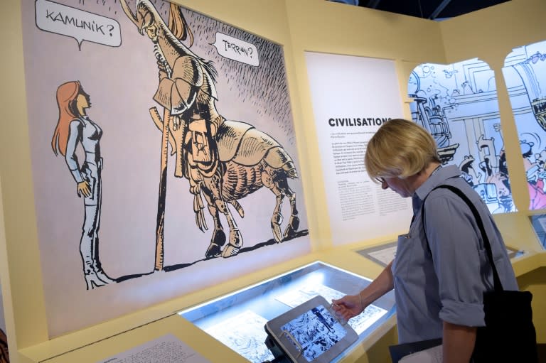 A person visits an exhibition dedicated to French science fiction comic series Valerian and Laureline at the Cite des Sciences et de l'Industrie museum in Paris