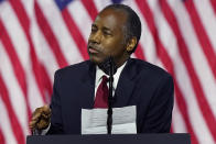 Secretary of Housing and Urban Development Ben Carson holds notes as he speaks during a campaign event before President Donald Trump at the Cobb Galleria Centre, Friday, Sept. 25, 2020, in Atlanta. (AP Photo/John Bazemore)