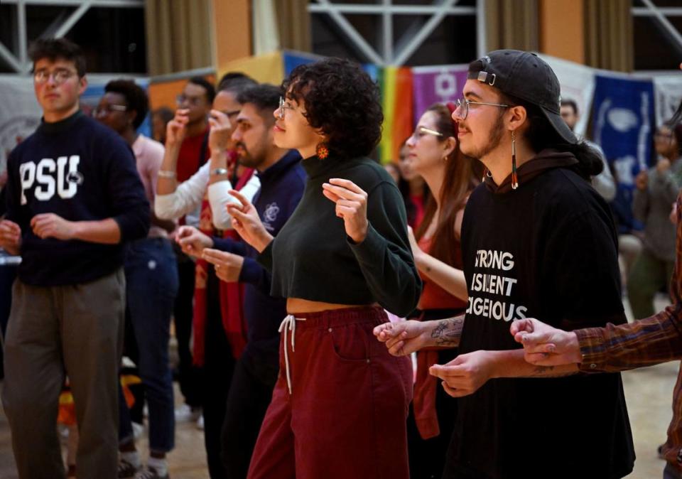 The crowd snaps along to a song by Las Cafeteras during the Indigenous Peoples Day Feast on Monday, Oct. 9, 2023 at the HUB Robeson Center on the Penn State campus. Abby Drey/adrey@centredaily.com