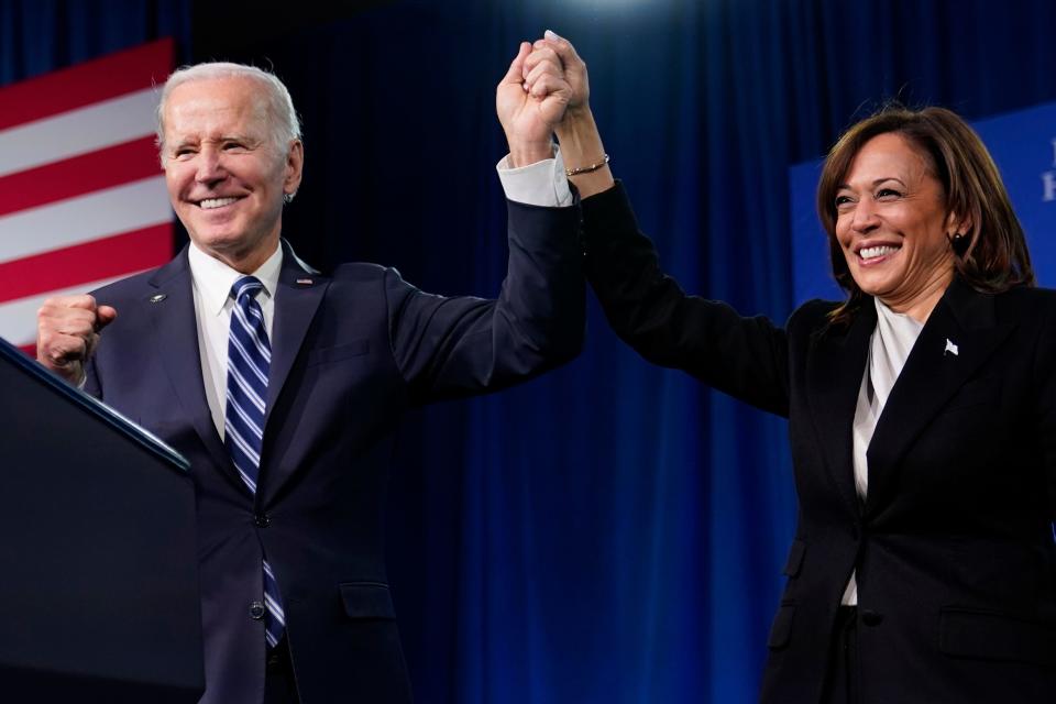 President Joe Biden and Vice President Kamala Harris stand on stage at the Democratic National Committee winter meeting, Feb. 3, 2023, in Philadelphia. Harris is poised to play a critical role in next year's election as President Joe Biden seeks a second term.