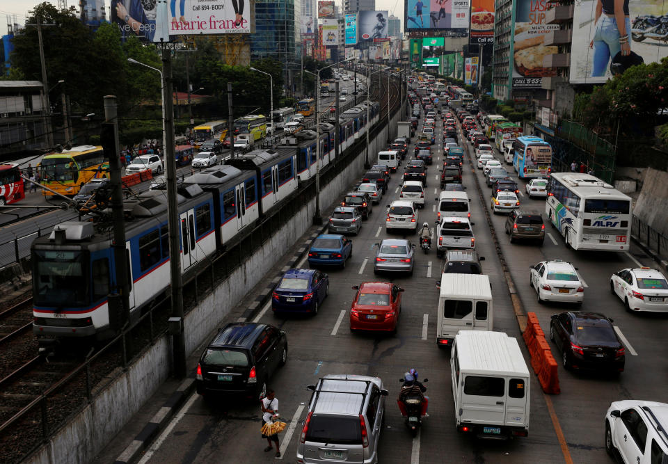 File Photo: Motorists drive through a heavy traffic flow during rush hours along the main highway EDSA in Makati, Metro Manila, Philippines. REUTERS/Erik De Castro