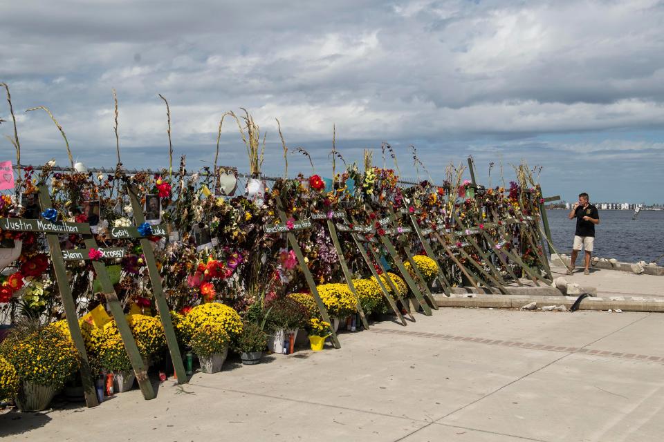 A memorial for Hurricane Ian victims has at Centennial Park in Fort Myers, Fla. on Sunday, October 9, 2022. 